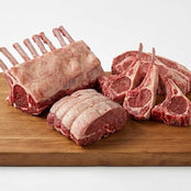 Lamb and veal cuts on a wooden board