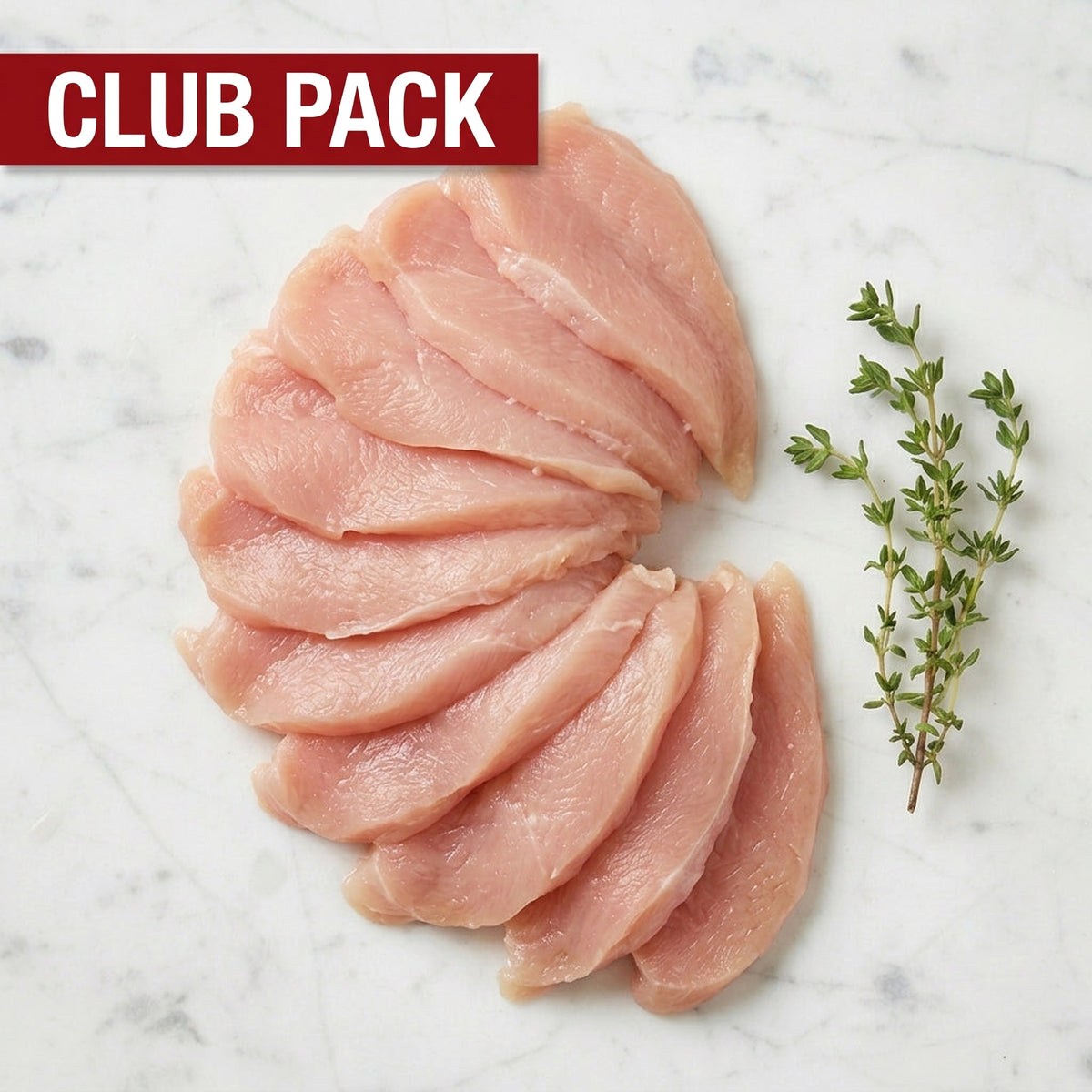 Club Pack of thin raw chicken cutlets fanned in a curve with thyme on white marble
